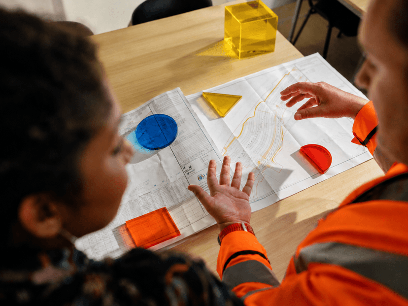 How can AI help reduce construction costs?